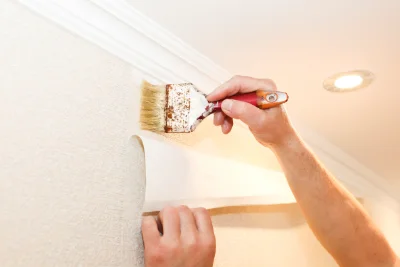 Pose de papier peint à Fajolles — revêtements muraux et toiles de verre